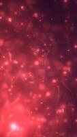 Red glowing bokeh lights floating in soft blurred background, abstract festive illumination video