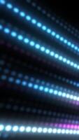 A vibrant array of blue and pink dots lined up in rows with a bokeh-like effect, creating a glowing neon pattern that evokes a sense of rhythm and energy video