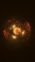 A bright glowing burst of particles surrounded by a dark backdrop, creating a dynamic and energetic feel with warm orange and yellow hues video