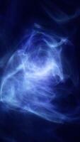A swirling cloud of blue mist with hints of white, creating an ethereal and atmospheric effect. The smooth motion of the wisps suggests a sense of movement and fluidity video