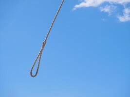 Rope Loop Hanging Against Blue Sky photo