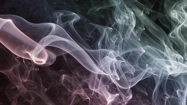 Swirling Patterns of Colorful Smoke Flowing Gracefully Against a Dark Backdrop photo