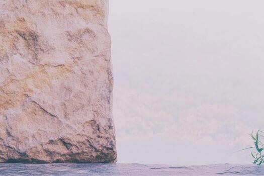 Scenic view of a stone ledge overlooking a tranquil landscape at dawn photo