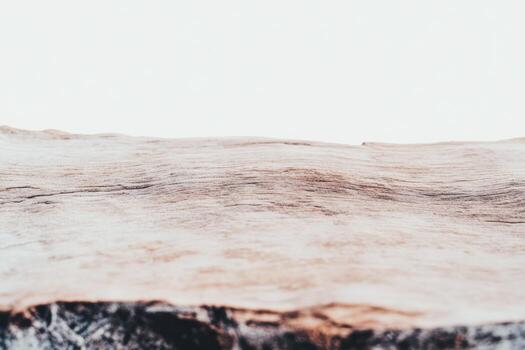 Textured wood surface showcasing natural patterns and grains at close range photo