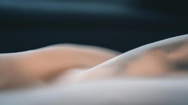 Soft fabric draping gracefully in natural light creates a calming texture photo