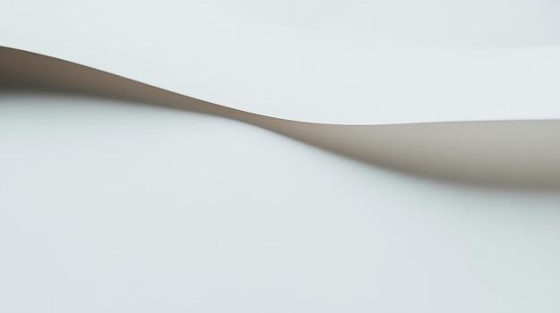 Soft curves of smooth paper reflecting light in minimalistic design photo