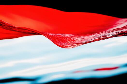 Vibrant red and blue waves create a striking abstract water design photo