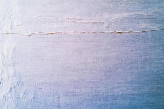 Delicate textures of a painted wall captured in soft colors and natural light photo