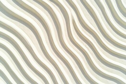 Textured surface features smooth, wavy patterns illuminated by bright sunlight photo