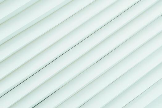 Diagonal lines create a modern texture on a white surface photo