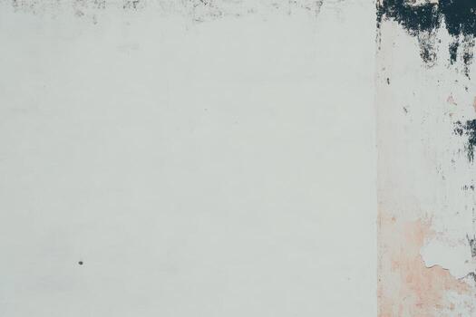 Textured wall surface showcasing rustic colors and peeling paint layers photo