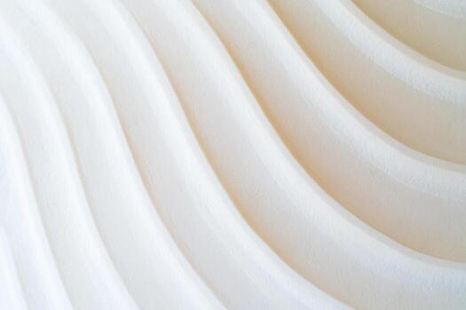 Wavy patterns of soft white texture on a smooth surface photo