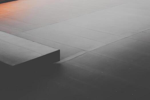 Textures of minimalist indoor space with contrasting light and shadows photo