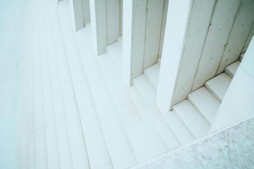 White concrete stairway with minimalist design and soft natural light photo