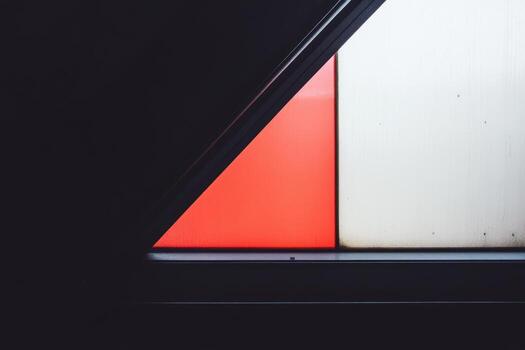 Colorful geometric shapes interacting with light in a modern setting photo