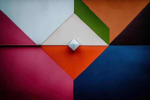 Colorful geometric wall mural in an urban setting during daylight hours photo