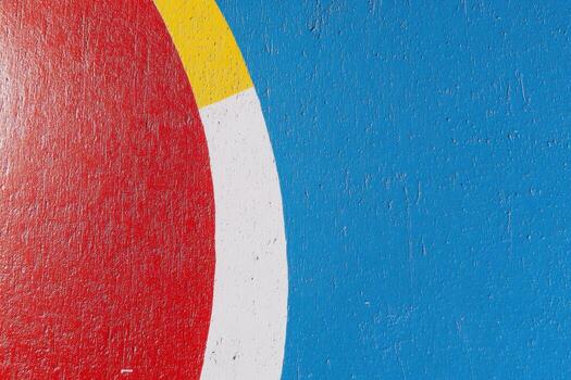 Colorful abstract mural displaying red, yellow, white, and blue elements photo