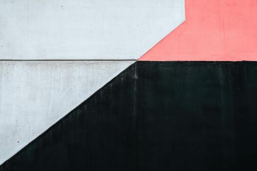 Geometric abstract design on a concrete wall in urban environment photo