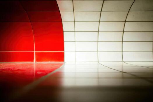 Curved red and white tiles create a modern, artistic space indoors photo