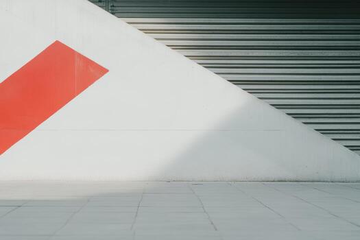 Modern geometric design on urban wall in sunlight with shadow play photo