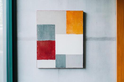 Abstract geometric art piece displayed in a modern interior photo
