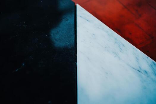 Contrast of black and white marble surfaces in an artistic setting photo