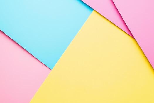 Colorful paper sheets arranged in a creative design on a flat surface photo