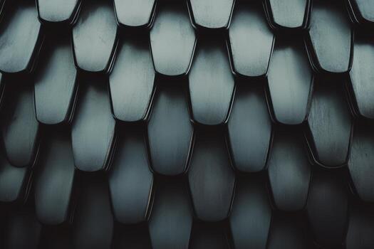 Elegant black shingles create a textured facade in modern architecture photo