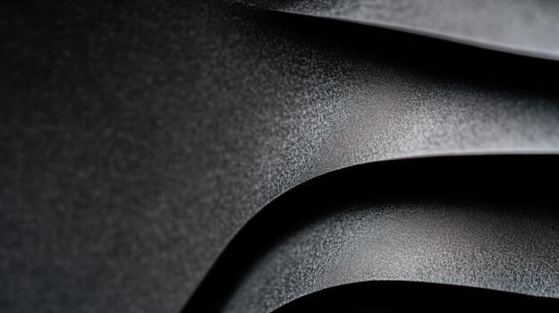 Abstract design showcasing smooth curves and textures in dark colors photo