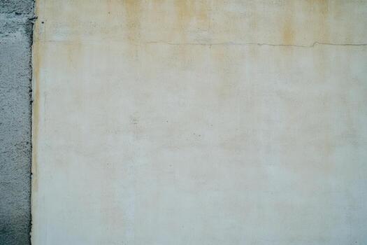 Wall texture in urban environment with neutral tones at midday photo