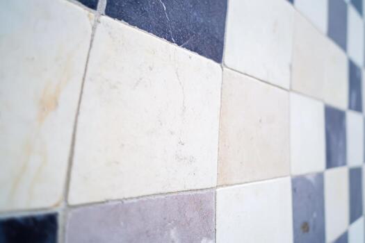 Checkerboard floor tiles in varying colors showcasing classic design photo