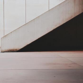 Visual contrast between concrete stairs and shadow in urban setting photo