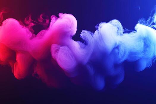 Colorful smoke swirls create dynamic patterns against a dark background photo