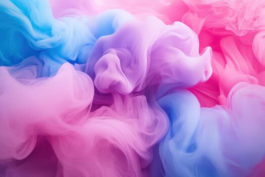 Vibrant swirls of pink and blue smoke create enchanting patterns in the air photo