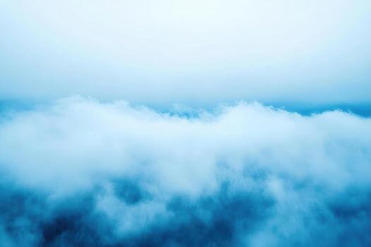 Serene blue clouds create a tranquil atmosphere above a vast landscape photo