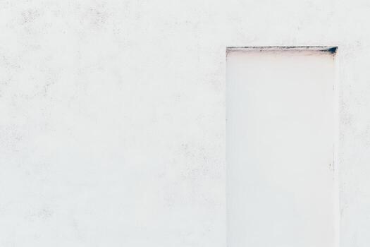 White wall with an empty doorway creates a minimalist architectural detail photo