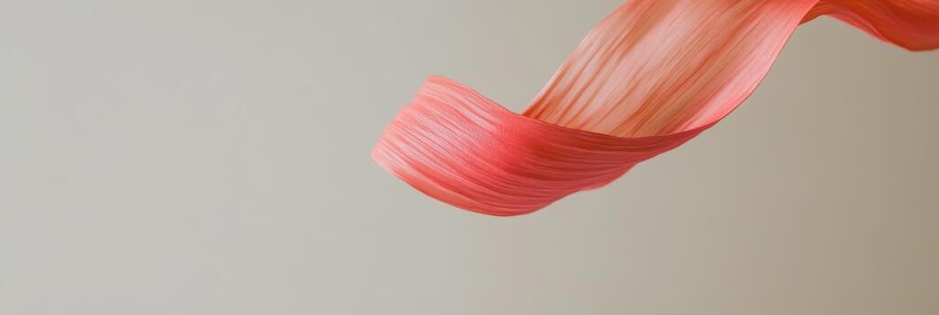 Colorful wave of textured fabric captures movement in a minimalist space photo