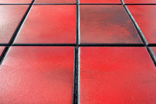 Vibrant red tiles create a striking geometric pattern on the floor photo