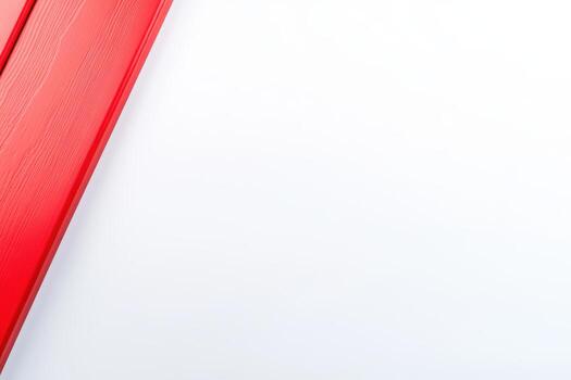 Bright red planks on a white background create a striking contrast photo