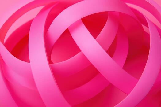 Bright pink ribbons twisted together create a striking visual display photo