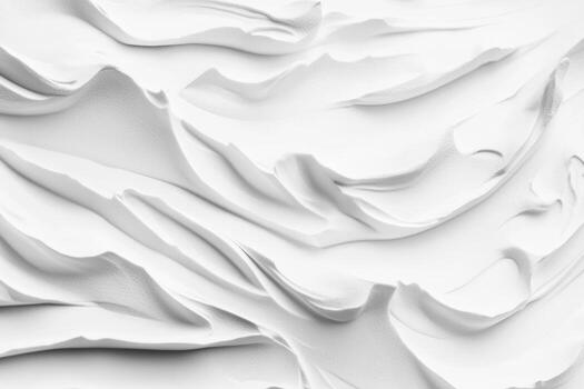 Texture of soft white fabric creates fluid waves and gentle folds photo