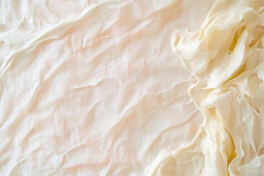 Soft textured fabric draped elegantly on a neutral background photo