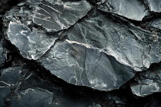 oscuro, texturizado pizarra rock formación en natural ajuste con intrincado detalles foto