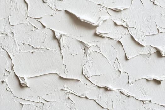 Textured white wall with intricate patterns resembles abstract art photo