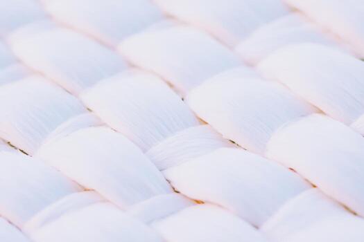 Close-up of detailed, intricately woven white textile pattern photo