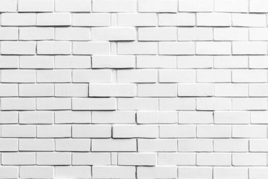 White brick wall texture with uniform pattern and clean appearance photo