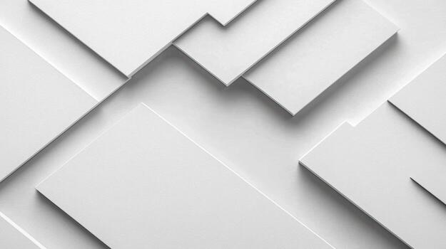 Various white paper sheets arranged in an overlapping pattern on a surface photo