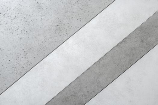 Modern concrete flooring design featuring diagonal patterns in grey tones photo