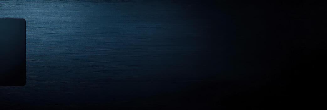 Dark metallic surface reflecting light in a modern design setting photo