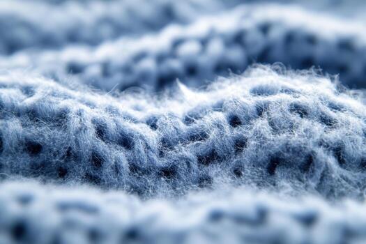 Textured blue fabric with intricate patterns in a soft, cozy environment photo